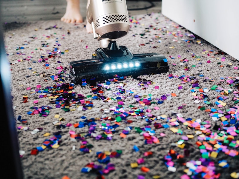 Professional facility operations staff sanitizing modern workplace floor